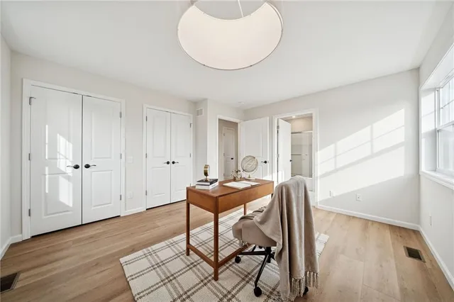 a workspace with wooden floor