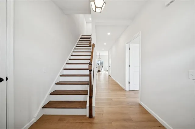 a view of entryway with wooden floor
