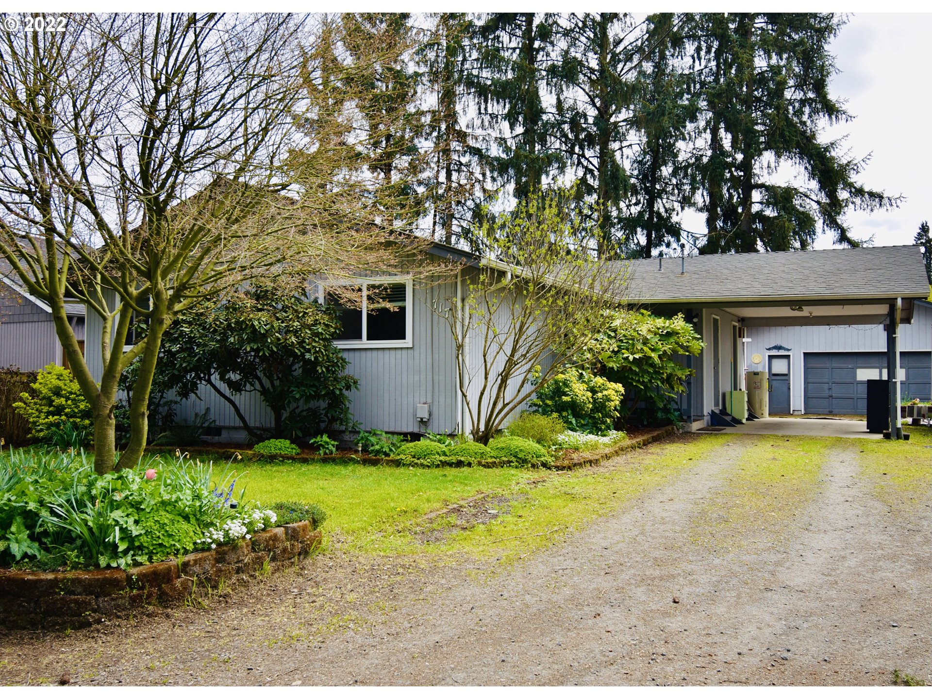 717 Night Hawk Lane Springfield, OR 97477 - Photo 1 of 32 a view of a house with a yard and garage