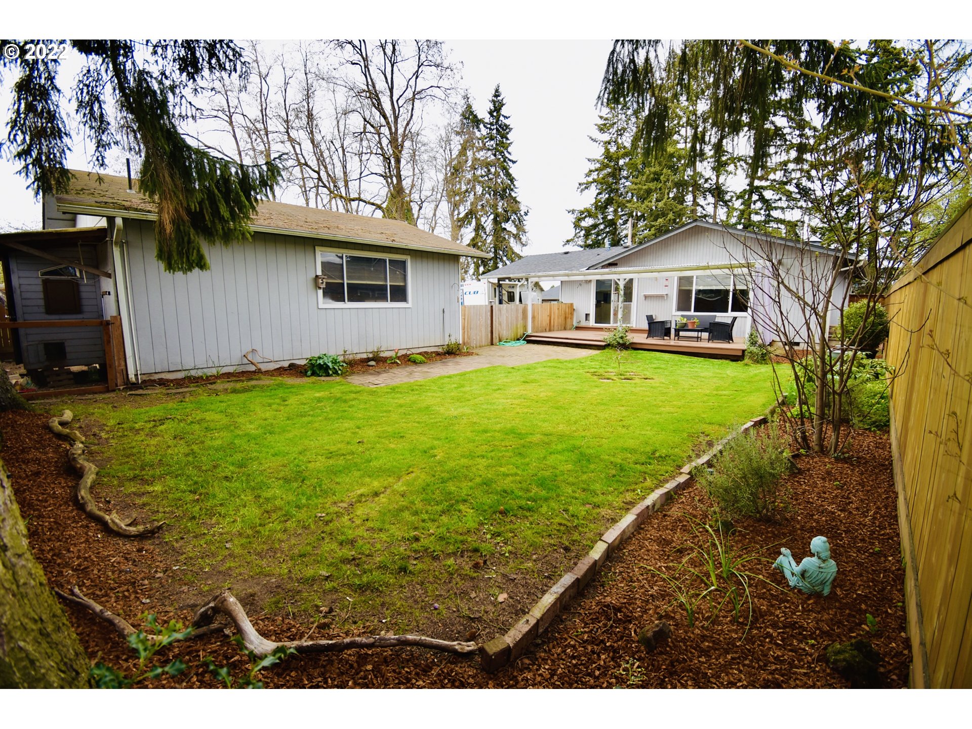 717 Night Hawk Lane Springfield, OR 97477 - Photo 15 of 32 a front view of house with yard and trees