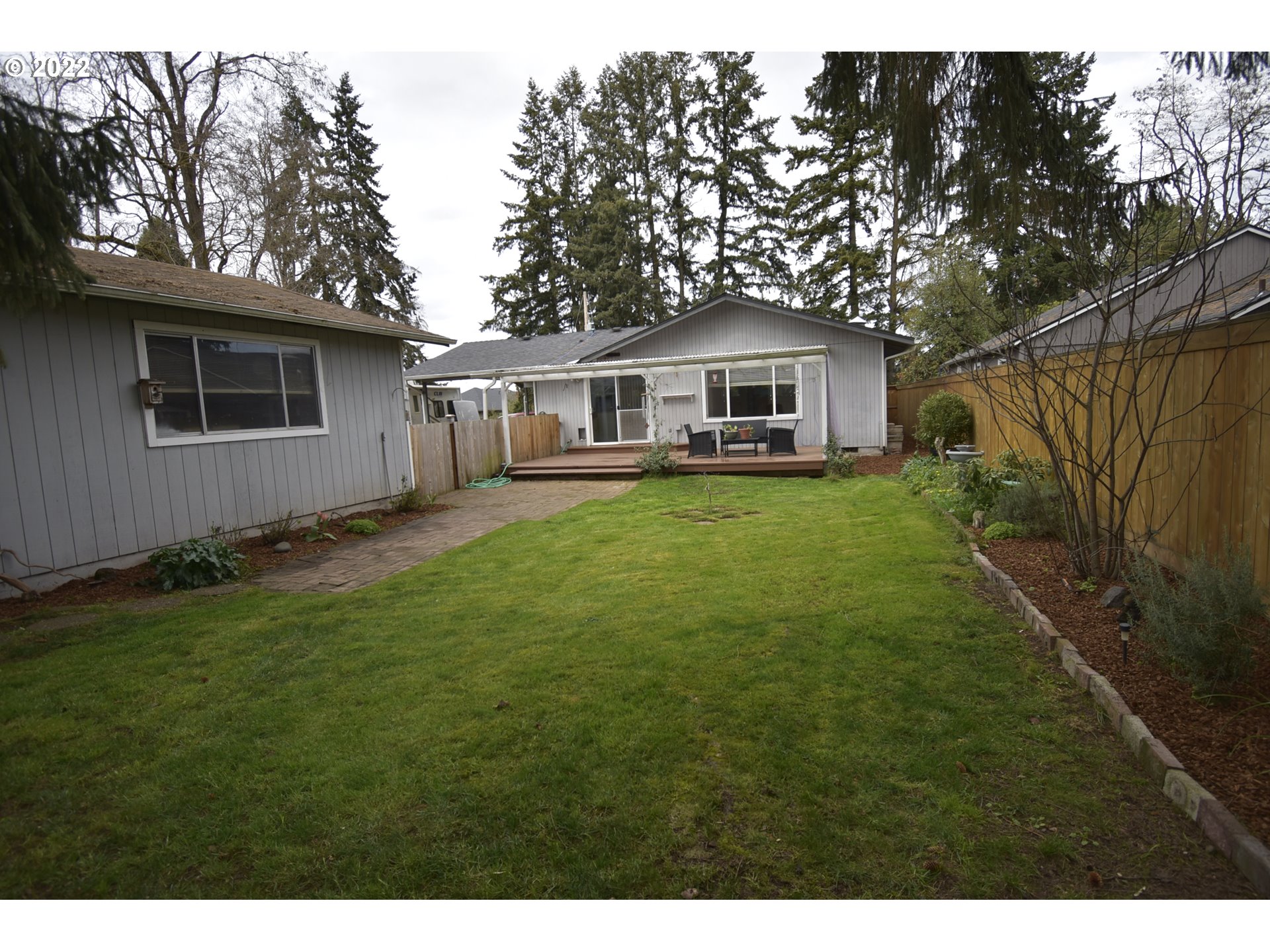 717 Night Hawk Lane Springfield, OR 97477 - Photo 17 of 32 a front view of house with yard and green space