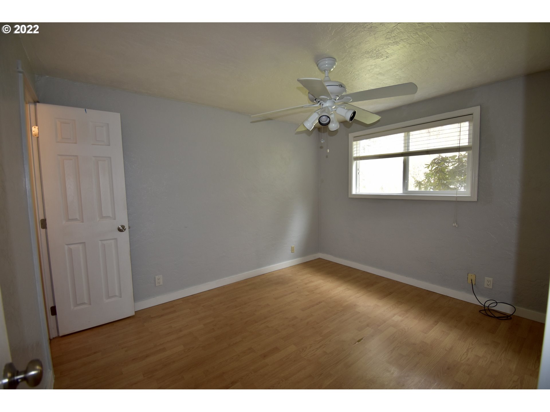 717 Night Hawk Lane Springfield, OR 97477 - Photo 9 of 32 a view of an empty room with a window