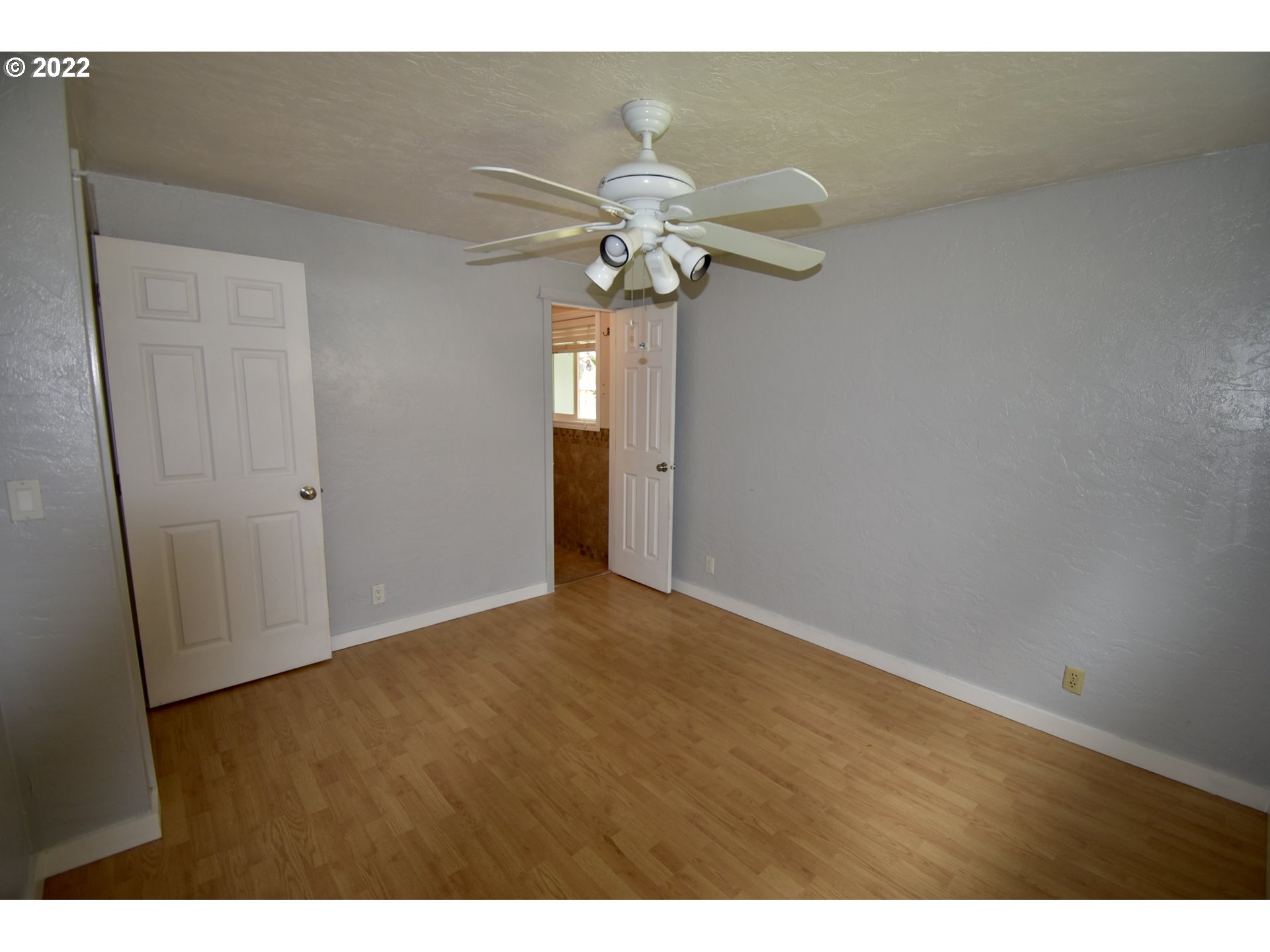 717 Night Hawk Lane Springfield, OR 97477 - Photo 10 of 32 a view of an empty room with a window