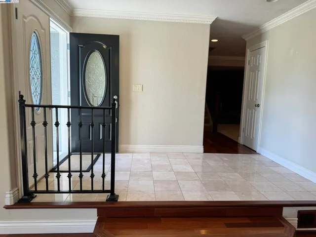 a view of a hallway with washer and dryer