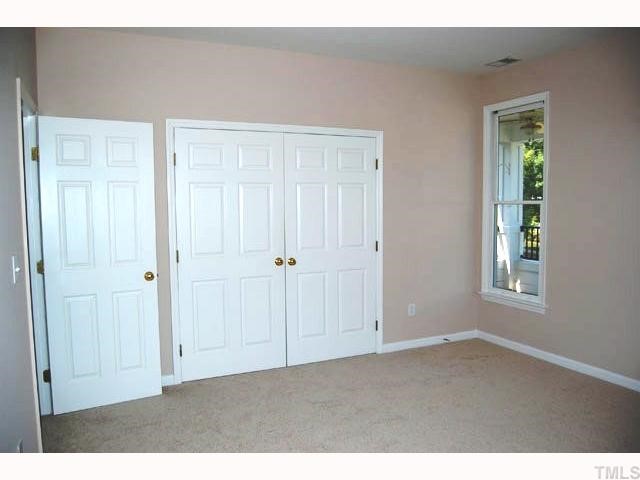 The master bedroom is a good size and offers a double door closet and has both a single and double window to let in plenty of light.
