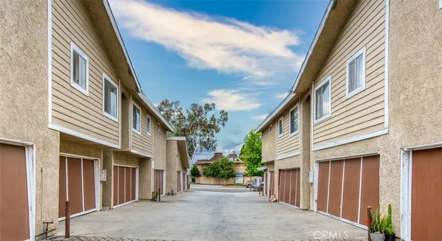 a view of a house with a street