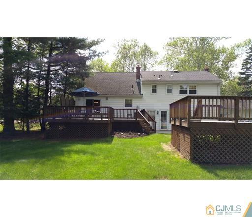 434 Plainfield Road Edison, NJ 08820 - Photo 15 of 16 a view of a house with a yard and sitting area