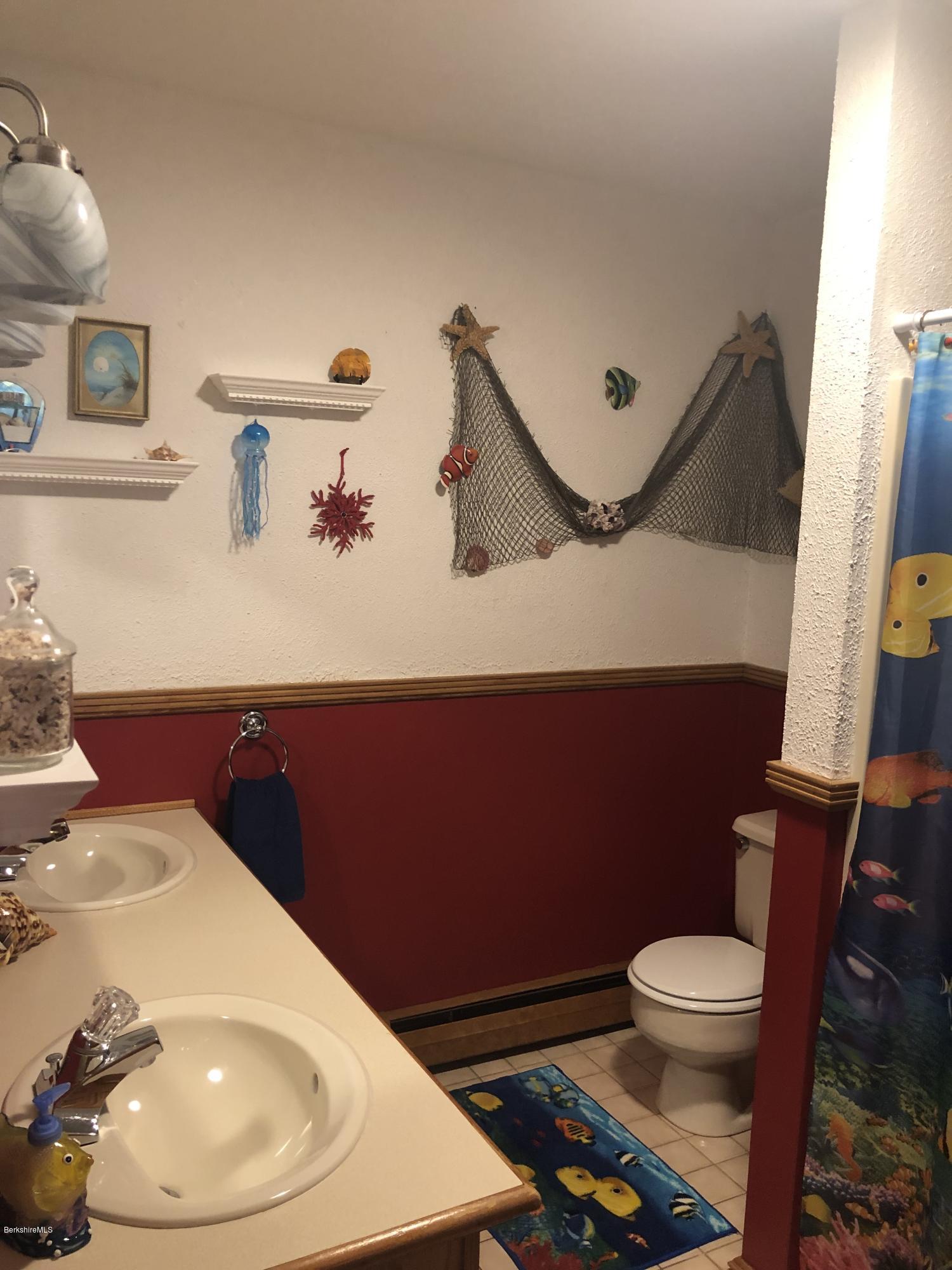 99 Middlefield Road Peru, MA 01235 - Photo 31 of 54 a bathroom with a toilet