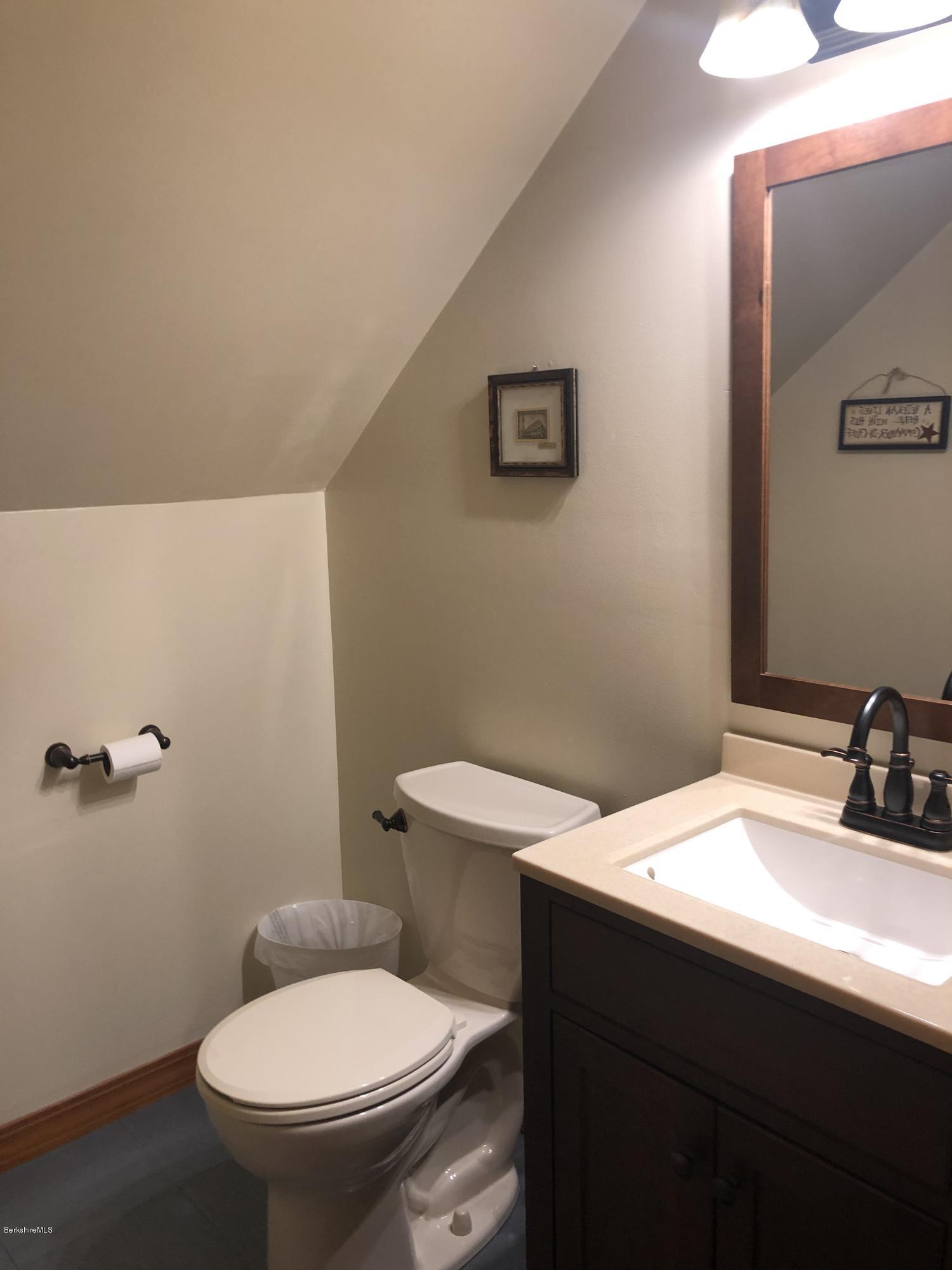 99 Middlefield Road Peru, MA 01235 - Photo 36 of 54 a bathroom with a sink and a toilet