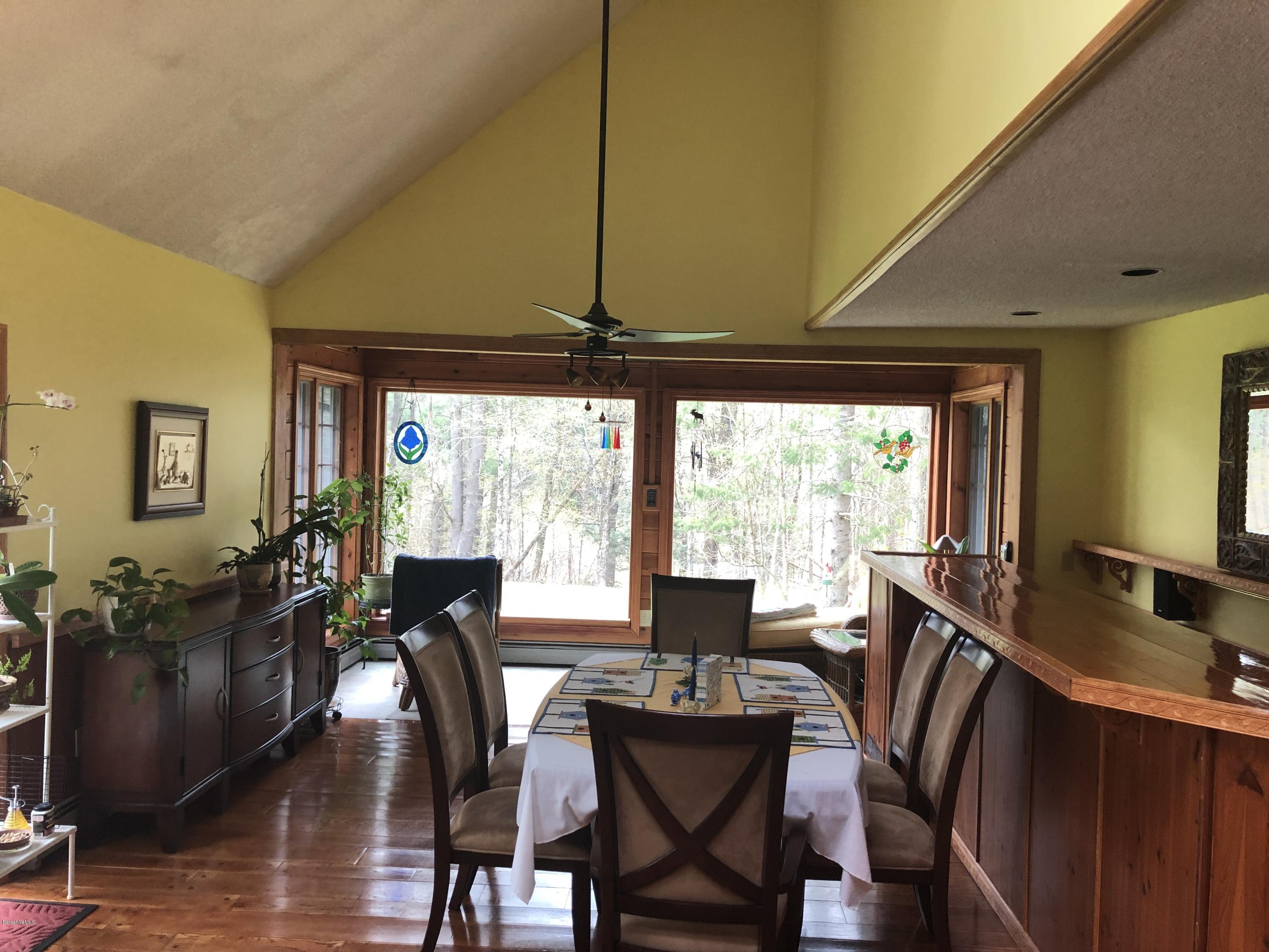 99 Middlefield Road Peru, MA 01235 - Photo 10 of 54 a view of a dining room with furniture window and outside view