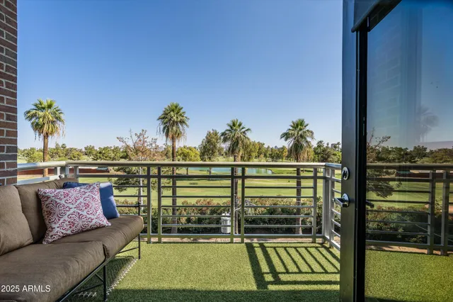 a view of a swimming pool with a lounge chairs