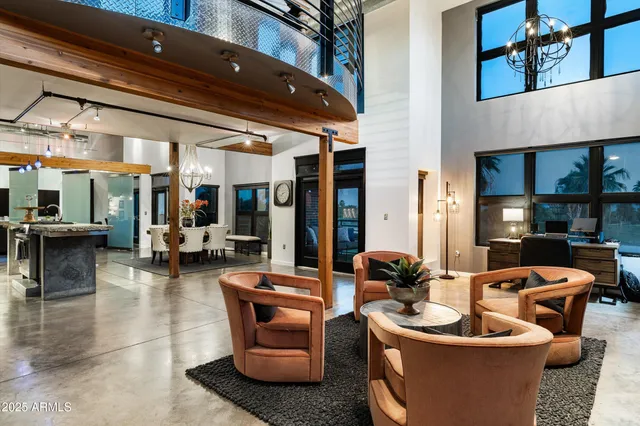 a large kitchen with stainless steel appliances kitchen island granite countertop a sink counter space and cabinets