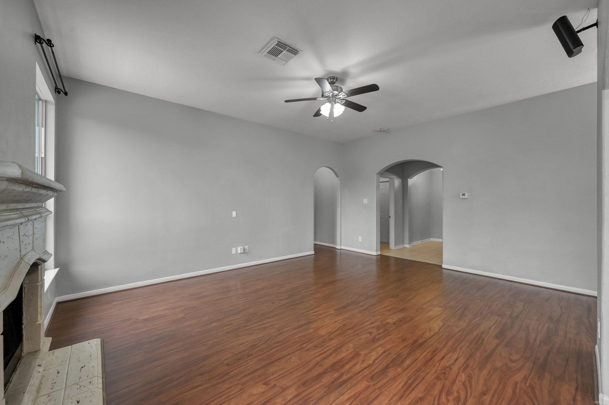 21331 Timber Pines Drive Spring, TX 77388 - Photo 5 of 22 Imagine setting up a couch and loveseat or your favorite chairs, along with an entertainment furniture piece in this space. It is the ideal spot to sit and connect with loved ones about your day, or even curl up with a good book next to a roaring fire on a cool winter's night!