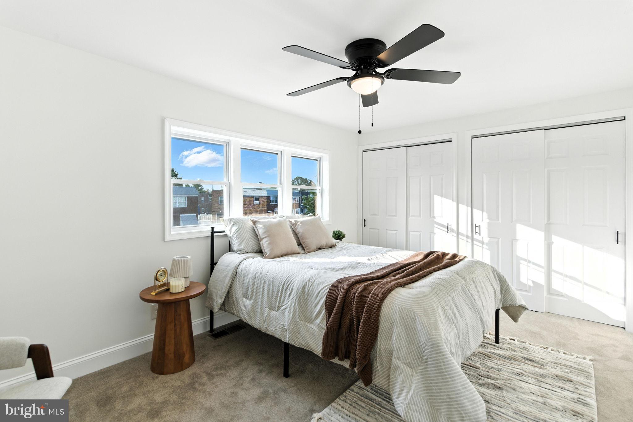 12125 Barbary Road Philadelphia, PA 19154 - Photo 11 of 26 a bedroom with a bed and a large window