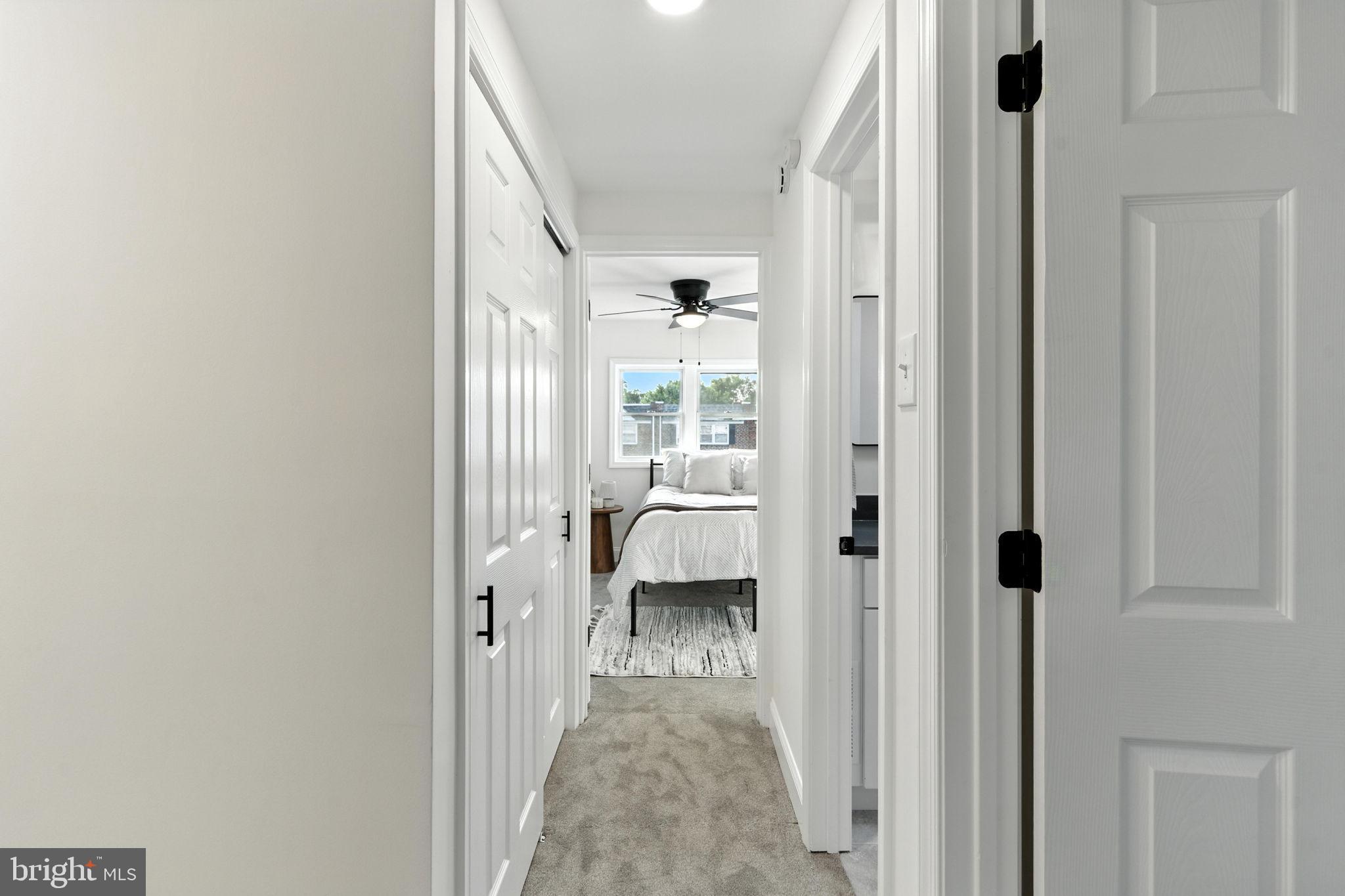 12125 Barbary Road Philadelphia, PA 19154 - Photo 14 of 26 a view of a hallway with a livingroom and a dinning room with windows