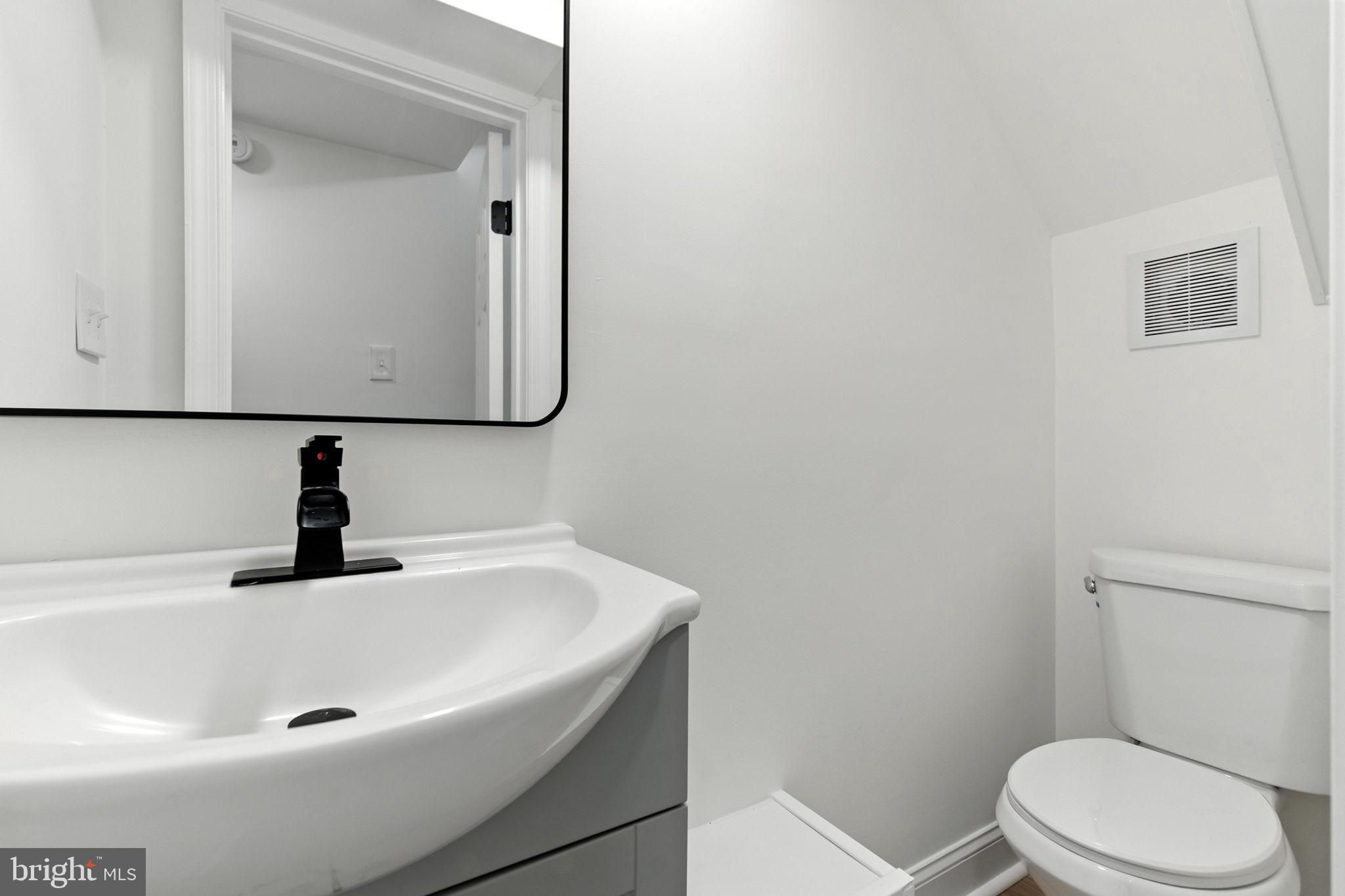 12125 Barbary Road Philadelphia, PA 19154 - Photo 17 of 26 a bathroom with a sink and a toilet