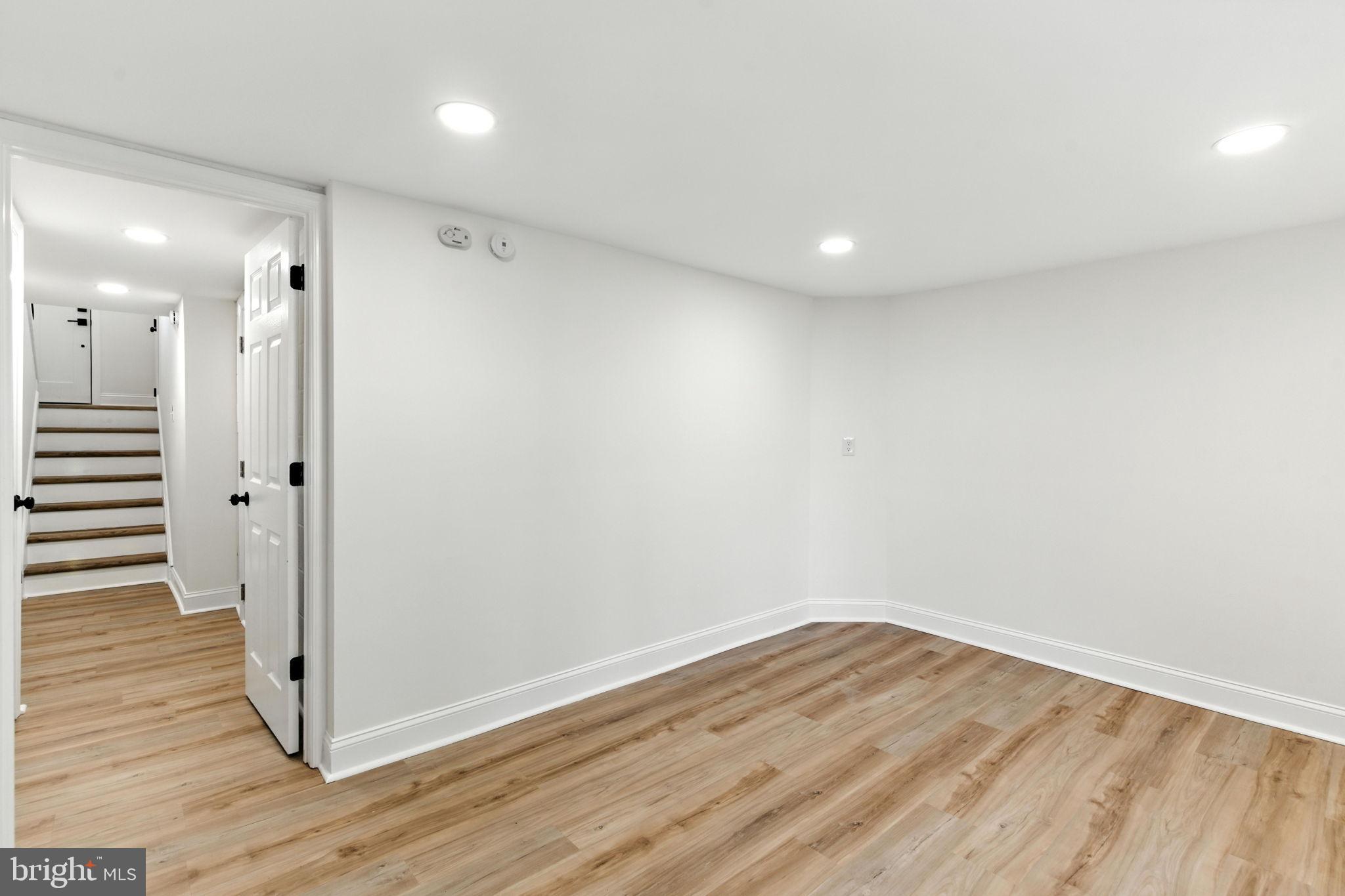 12125 Barbary Road Philadelphia, PA 19154 - Photo 18 of 26 a view of a room with wooden floor and white walls