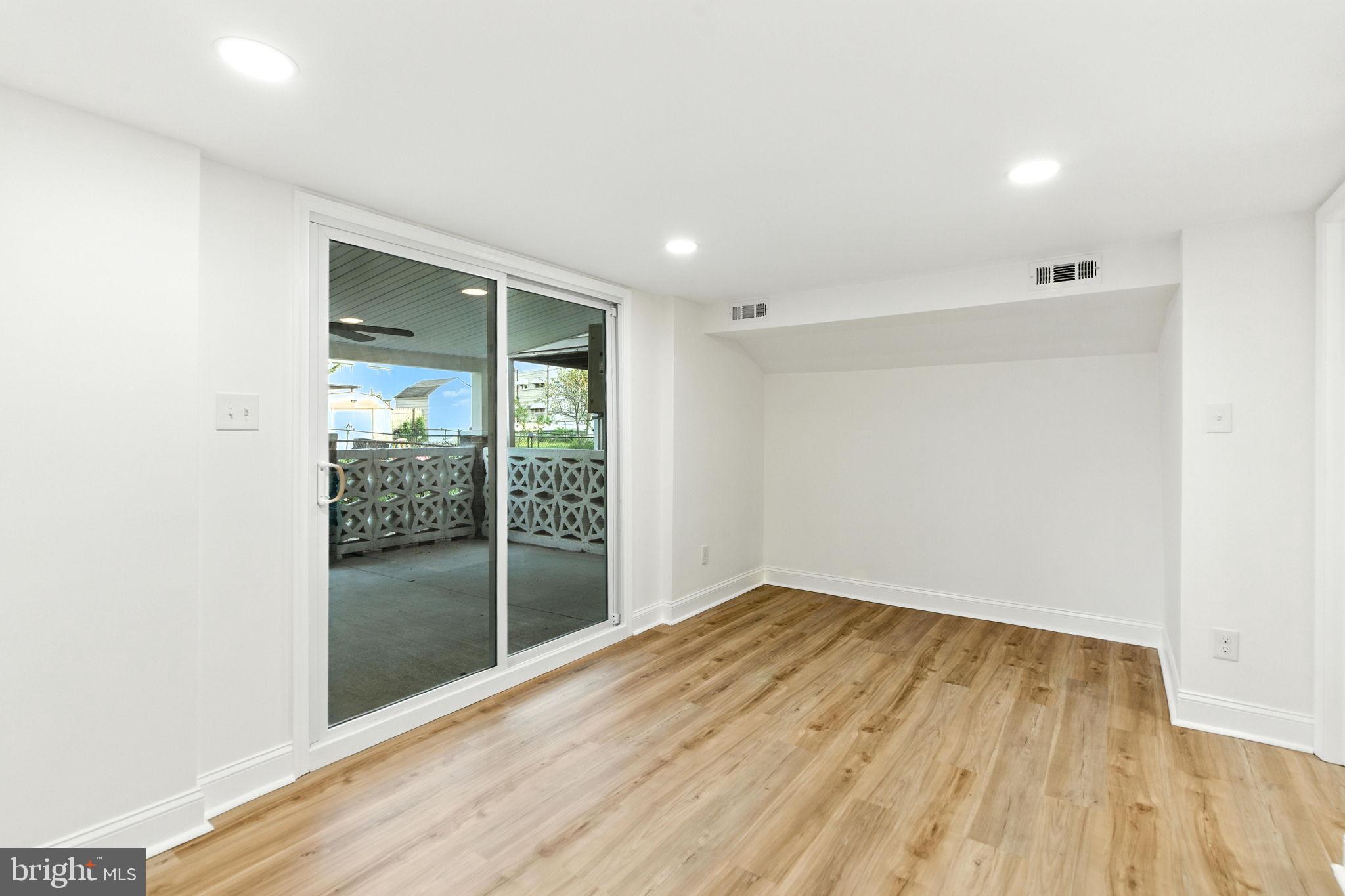 12125 Barbary Road Philadelphia, PA 19154 - Photo 20 of 26 a view of empty room with wooden floor
