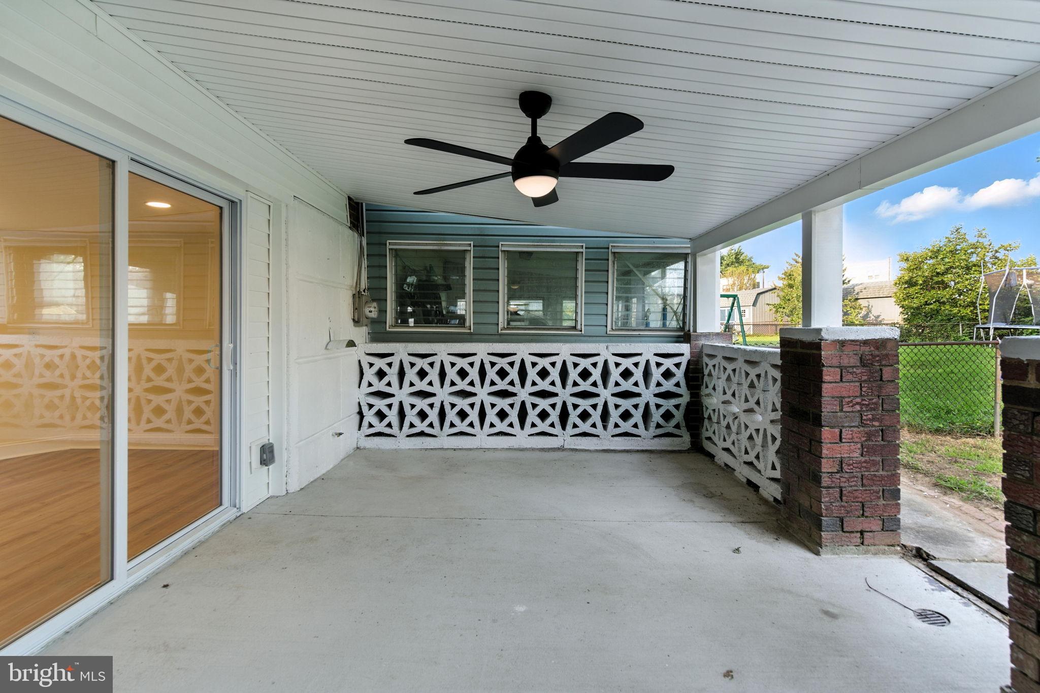 12125 Barbary Road Philadelphia, PA 19154 - Photo 22 of 26 a view of an empty room with a window and wooden floor