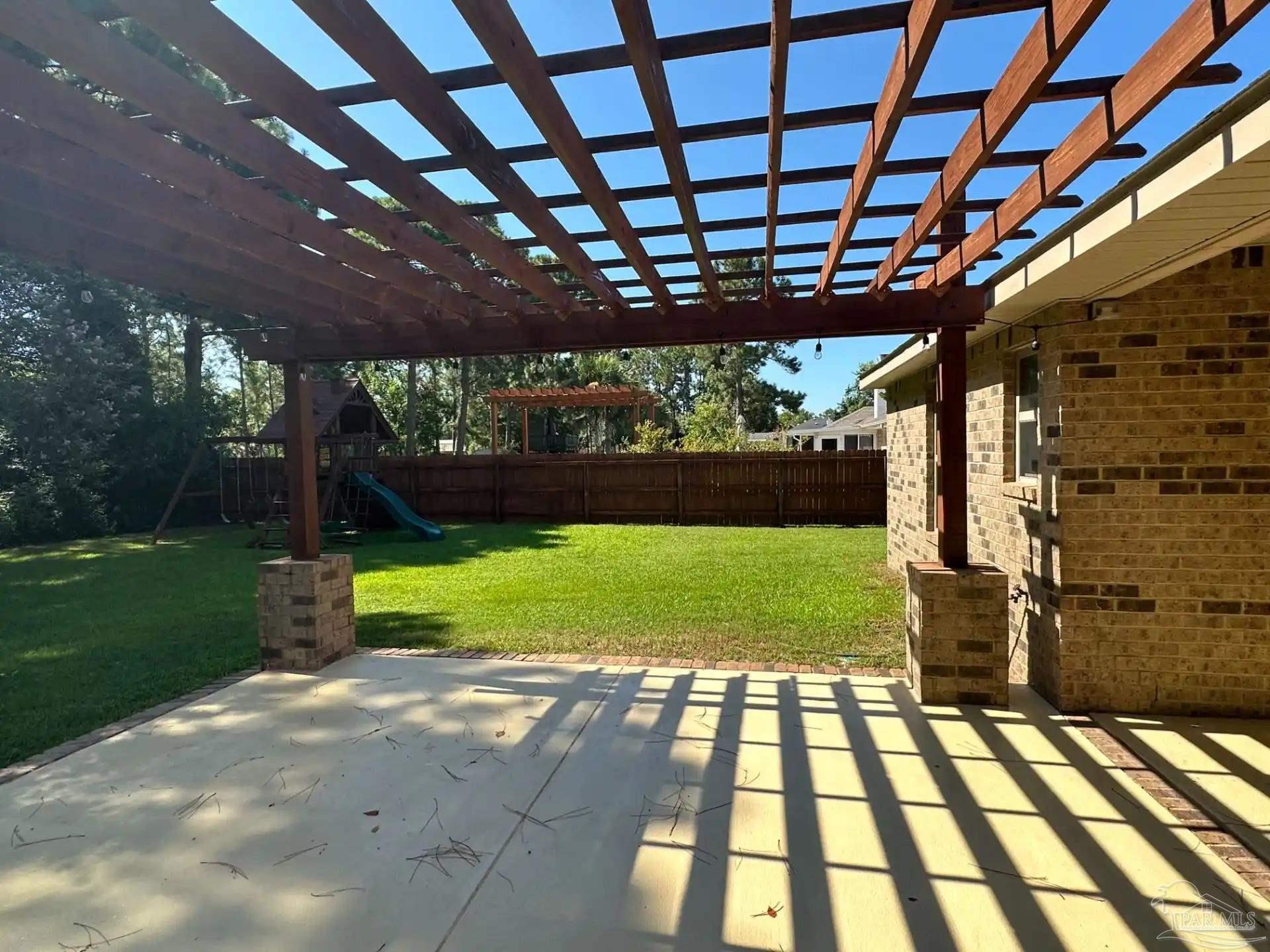 1938 Commodore Drive Navarre, FL 32566 - Photo 22 of 24 a view of yard