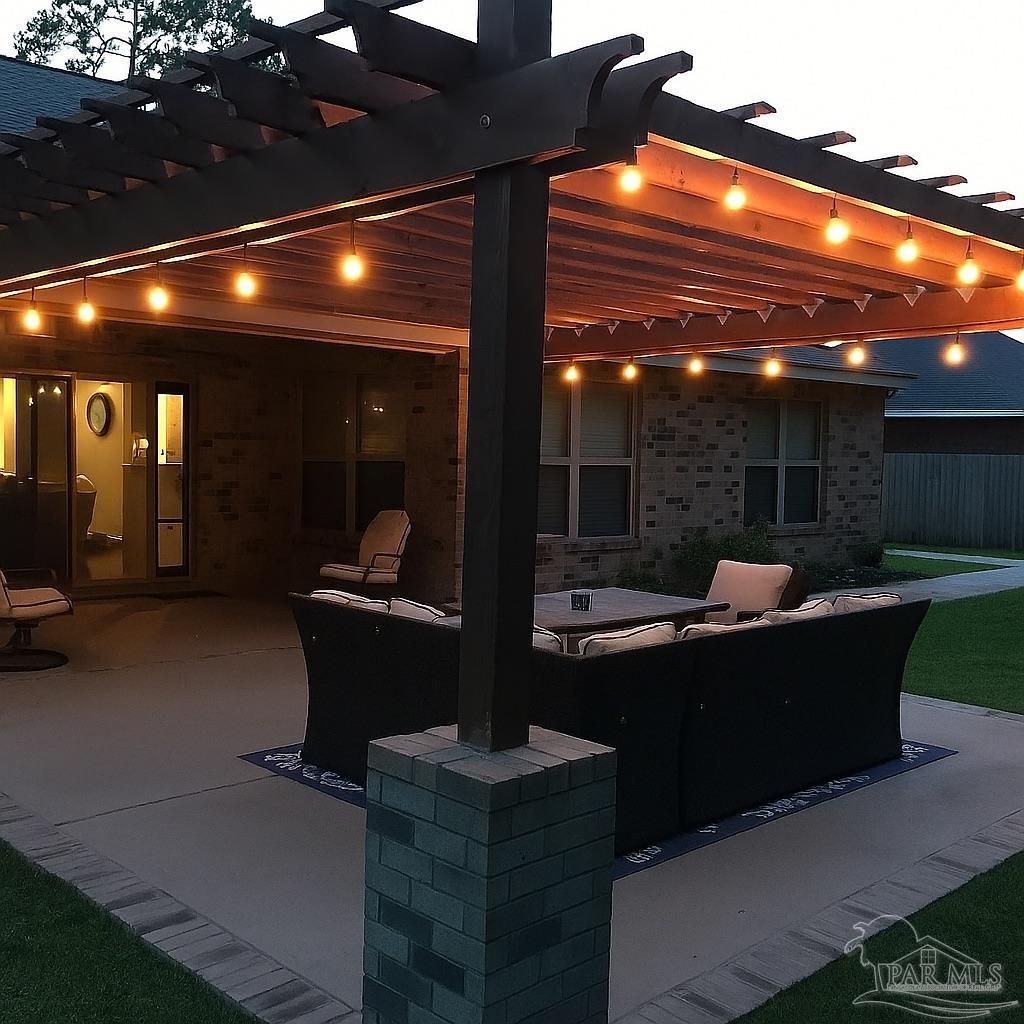 1938 Commodore Drive Navarre, FL 32566 - Photo 23 of 24 a view of a lobby with a couch and tables