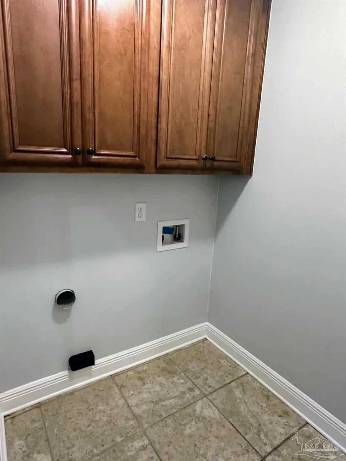 1938 Commodore Drive Navarre, FL 32566 - Photo 9 of 24 a view of a room with cabinets