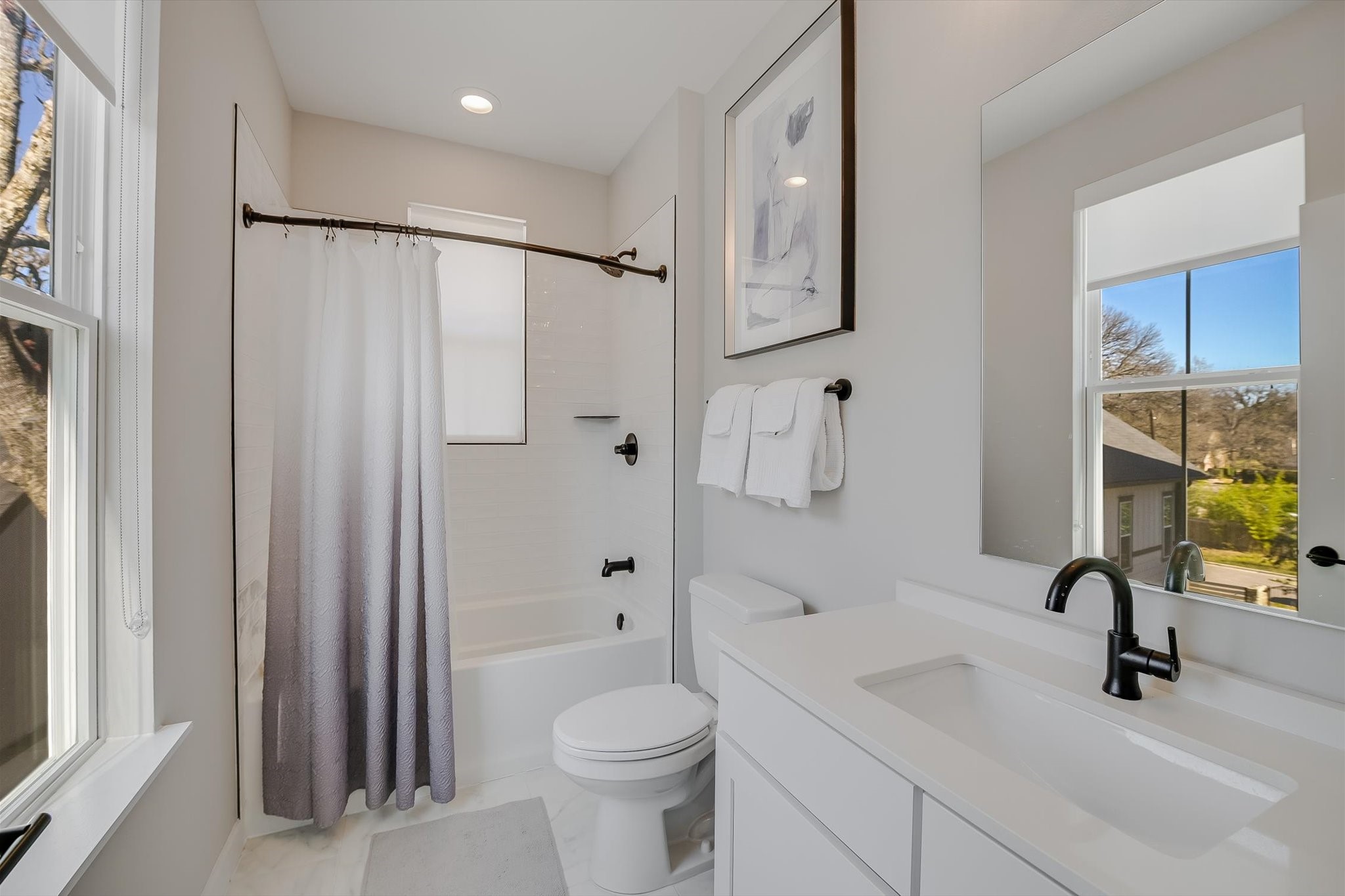 3809 Valley View Road, Unit 7 Austin, TX 78704 - Photo 16 of 21 Full bathroom featuring vanity, toilet, and shower / tub combo