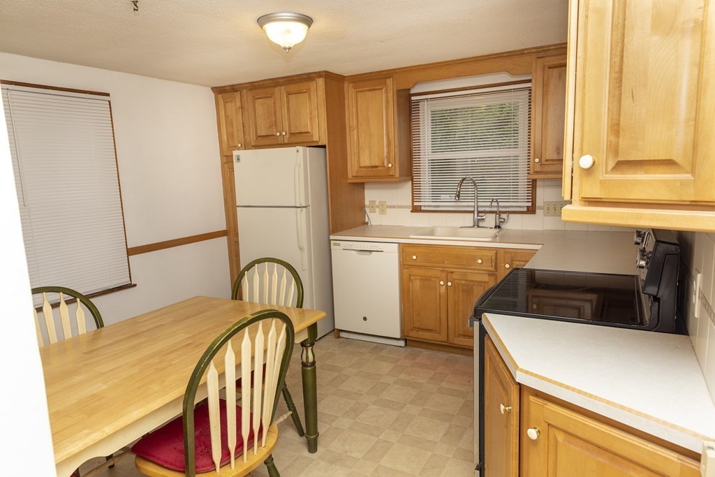 35 Anne Street Springfield, MA 01104 - Photo 5 of 28 a bedroom with a bed and dresser