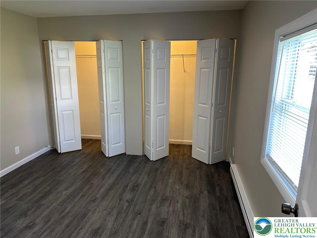 16 Grove Road Northampton, PA 18067 - Photo 7 of 11 a view of an empty room with wooden floor and a window