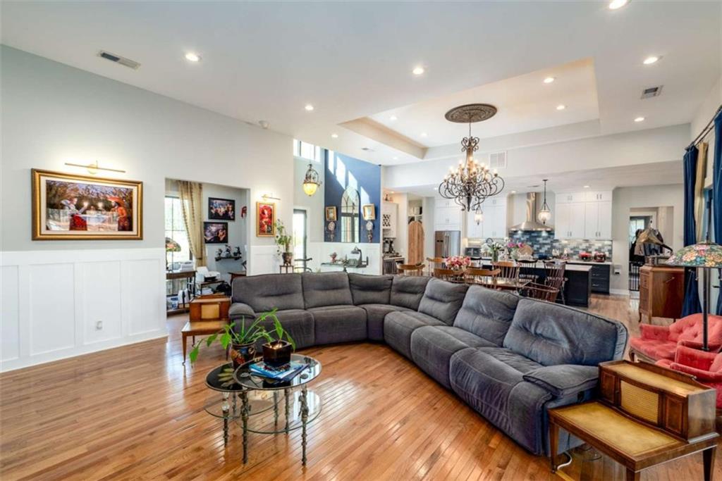 1953-1 Barton Brg Road Madison, GA 30650 - Photo 17 of 78 a living room with furniture kitchen view and a wooden floor