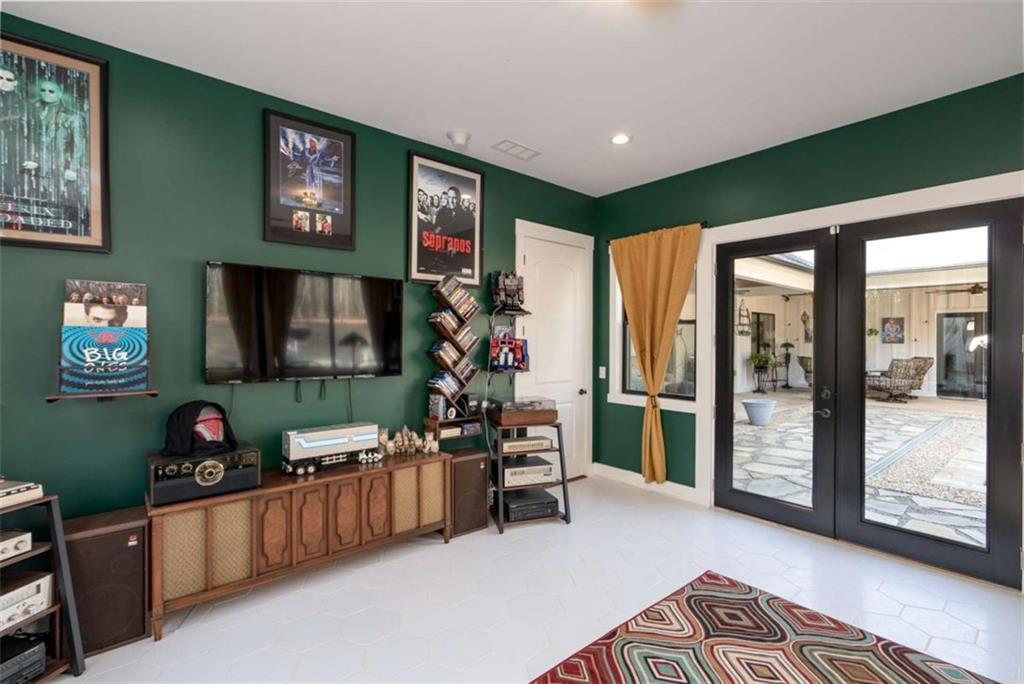 1953-1 Barton Brg Road Madison, GA 30650 - Photo 29 of 78 a living room with furniture and a flat screen tv