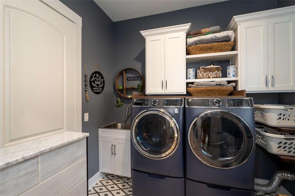 1953-1 Barton Brg Road Madison, GA 30650 - Photo 41 of 78 a utility room with sink dryer and washer