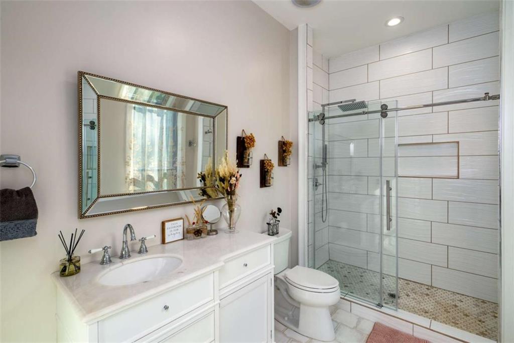 1953-1 Barton Brg Road Madison, GA 30650 - Photo 46 of 78 a bathroom with a sink toilet and shower