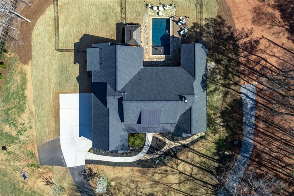1953-1 Barton Brg Road Madison, GA 30650 - Photo 5 of 78 an aerial view of a house with fountain and large trees