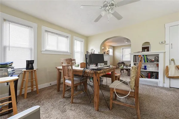 a view of a dining room with furniture