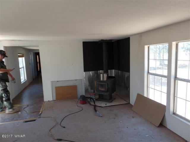 5384 Highway 260 Show Low, AZ 85901 - Photo 3 of 13 a living room with furniture and a window
