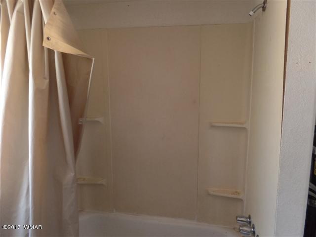 5384 Highway 260 Show Low, AZ 85901 - Photo 8 of 13 a bathroom with a shower