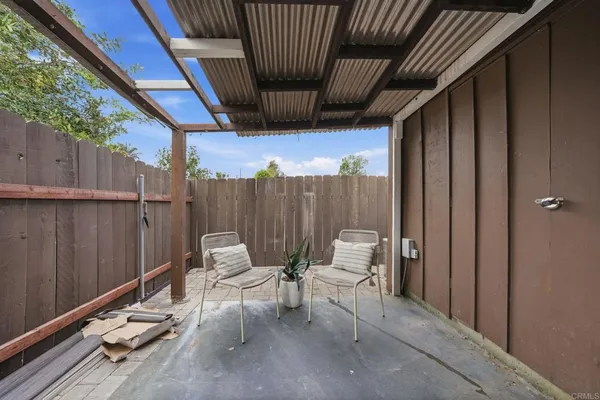 a view of chair and table in the patio