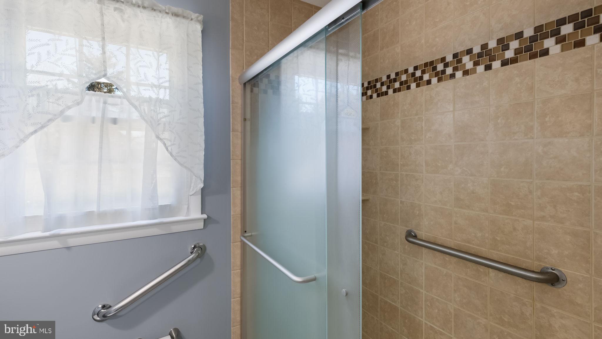 439 Shallcross Road Southampton, PA 18966 - Photo 28 of 41 Frosted glass doors with fully tiled stall shower
