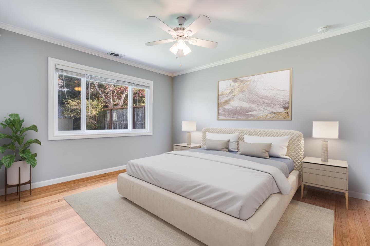 1419 Madeira Drive Pacifica, CA 94044 - Photo 12 of 66 a bedroom with a large bed potted plant and a window