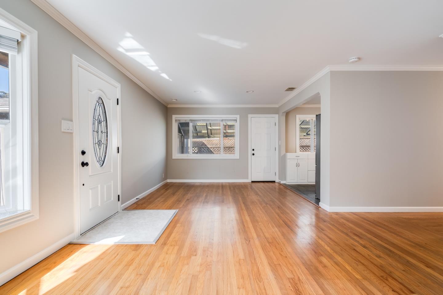 1419 Madeira Drive Pacifica, CA 94044 - Photo 20 of 66 wooden floor in an empty room with a window