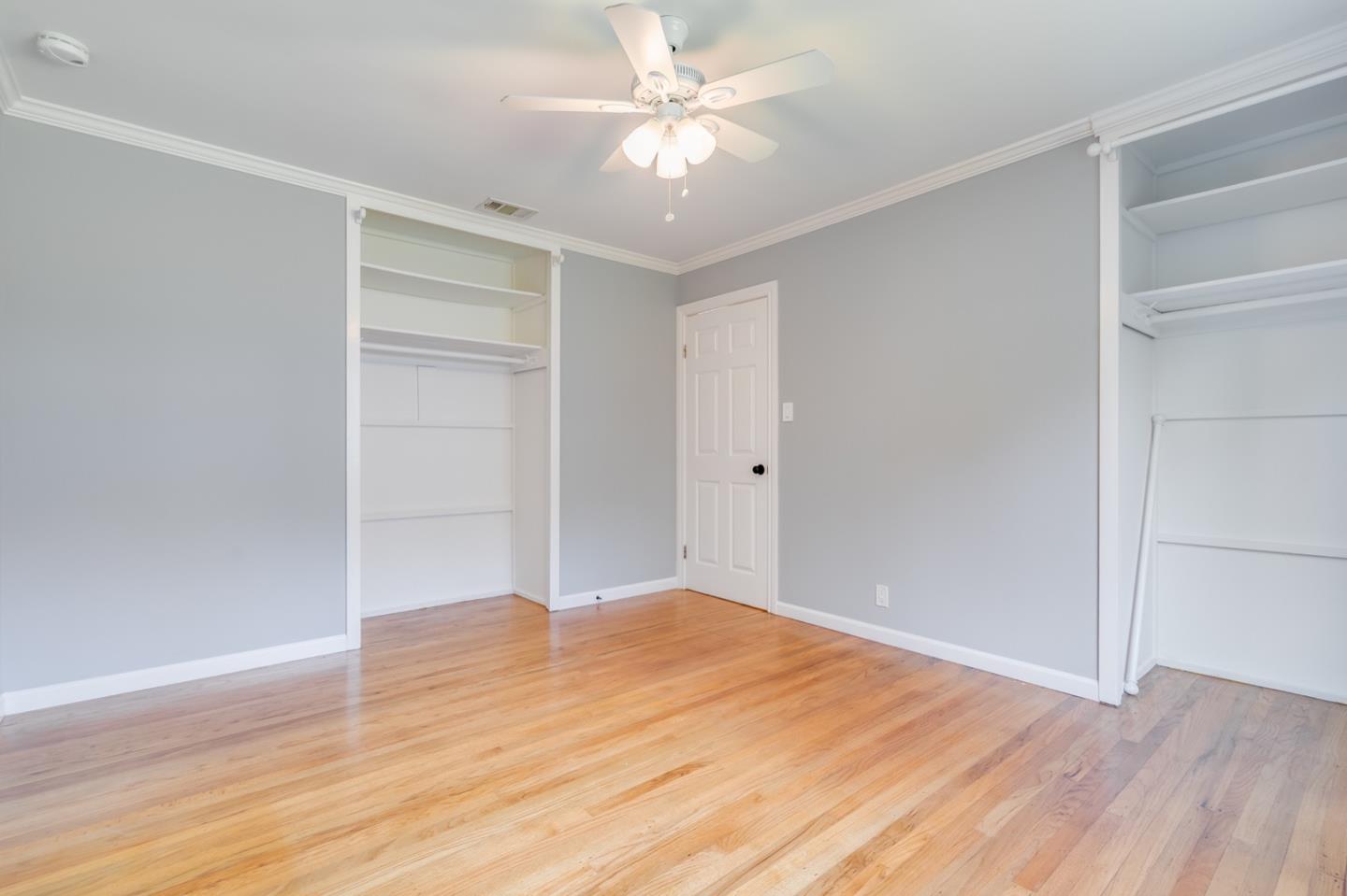 1419 Madeira Drive Pacifica, CA 94044 - Photo 32 of 66 a view of empty room with wooden floor