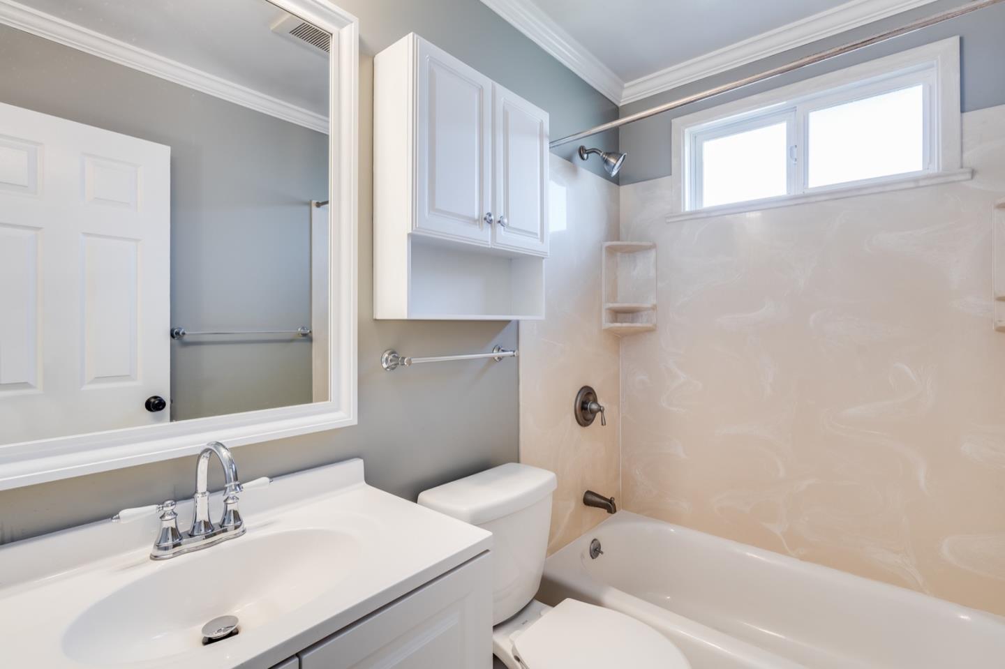 1419 Madeira Drive Pacifica, CA 94044 - Photo 35 of 66 a bathroom with a sink toilet and shower