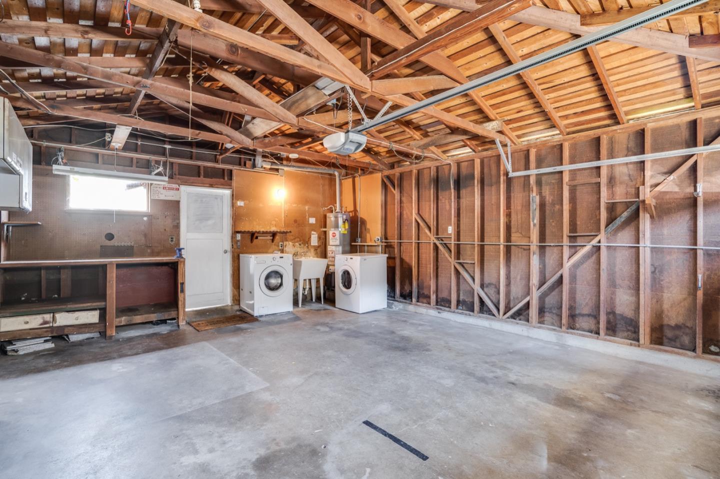 1419 Madeira Drive Pacifica, CA 94044 - Photo 47 of 66 a view of an empty room with wooden walls