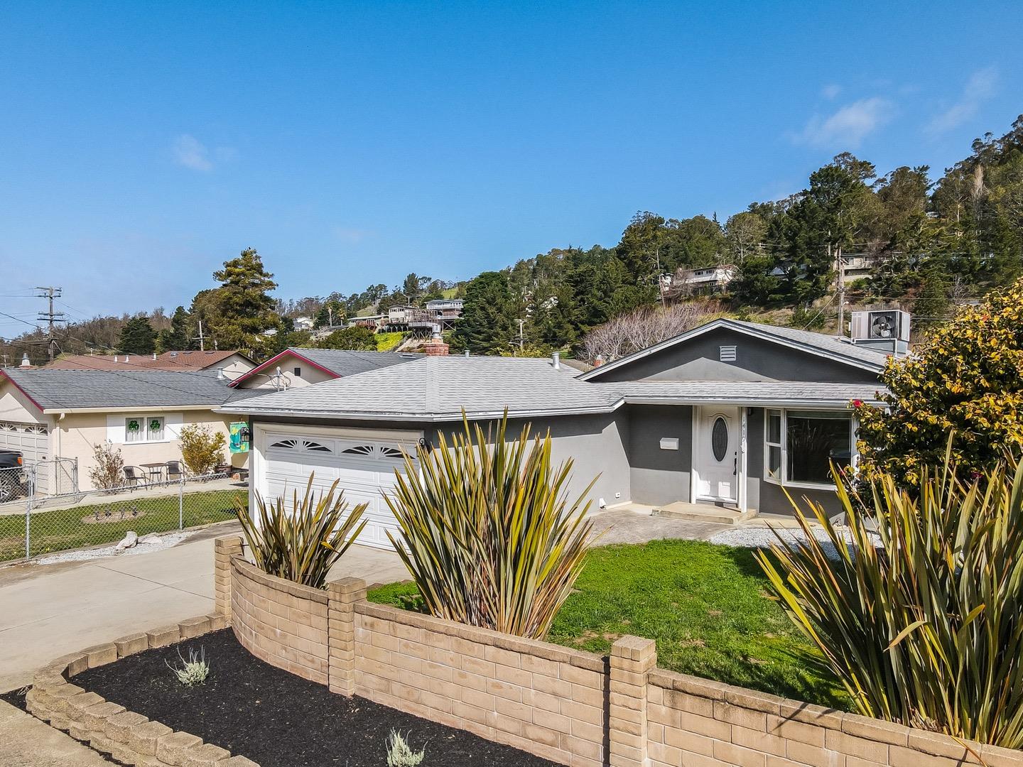 1419 Madeira Drive Pacifica, CA 94044 - Photo 60 of 66 a view of a chairs and table in patio with a small yard