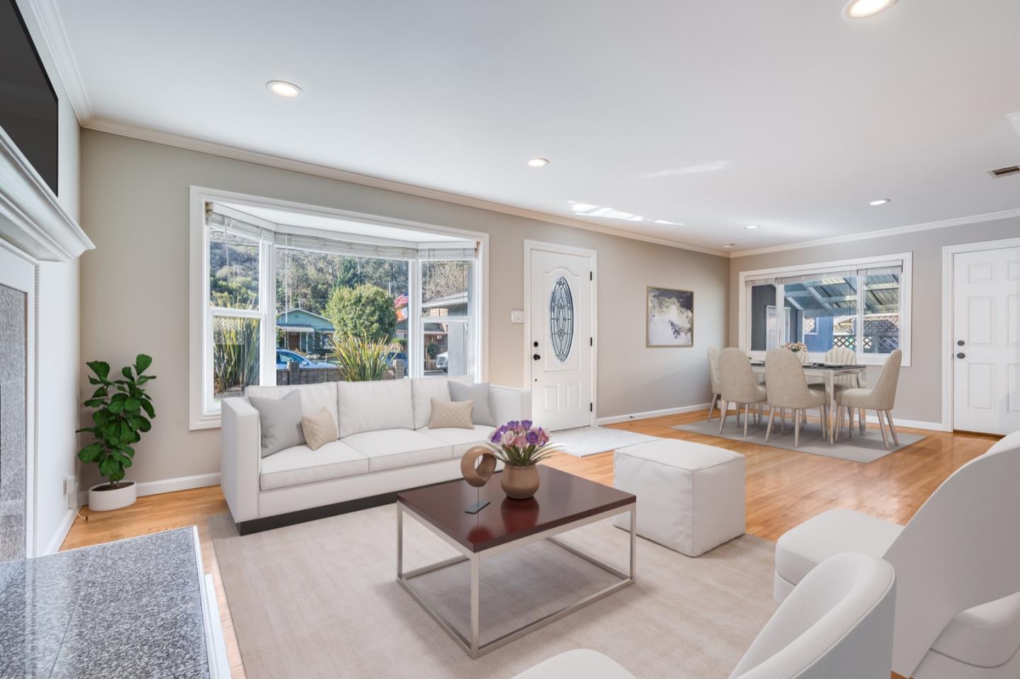 1419 Madeira Drive Pacifica, CA 94044 - Photo 9 of 66 a living room with furniture potted plant and a large window