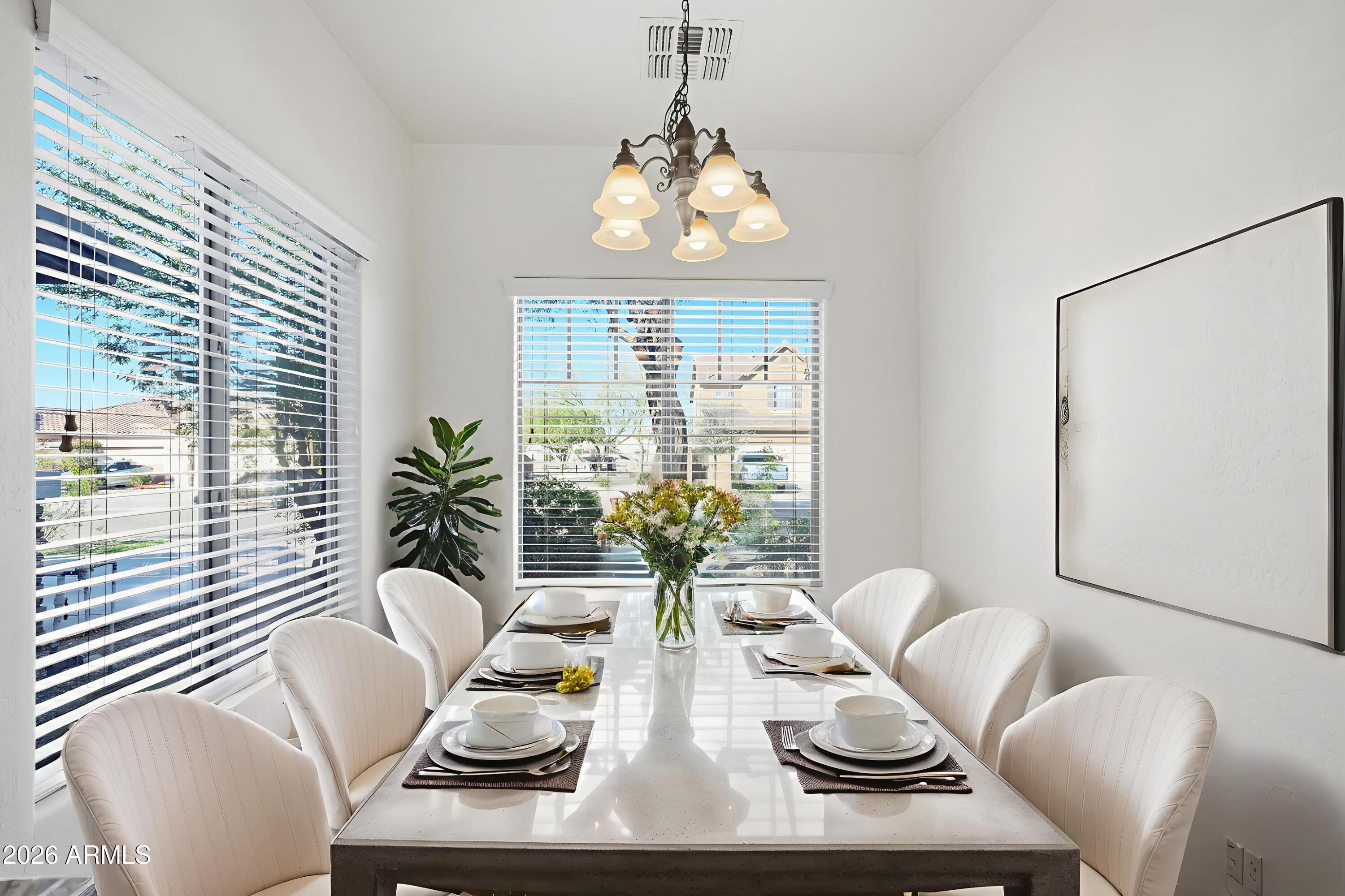 8851 West Payson Road Tolleson, AZ 85353 - Photo 11 of 32 a view of a dining room with furniture window and outside view