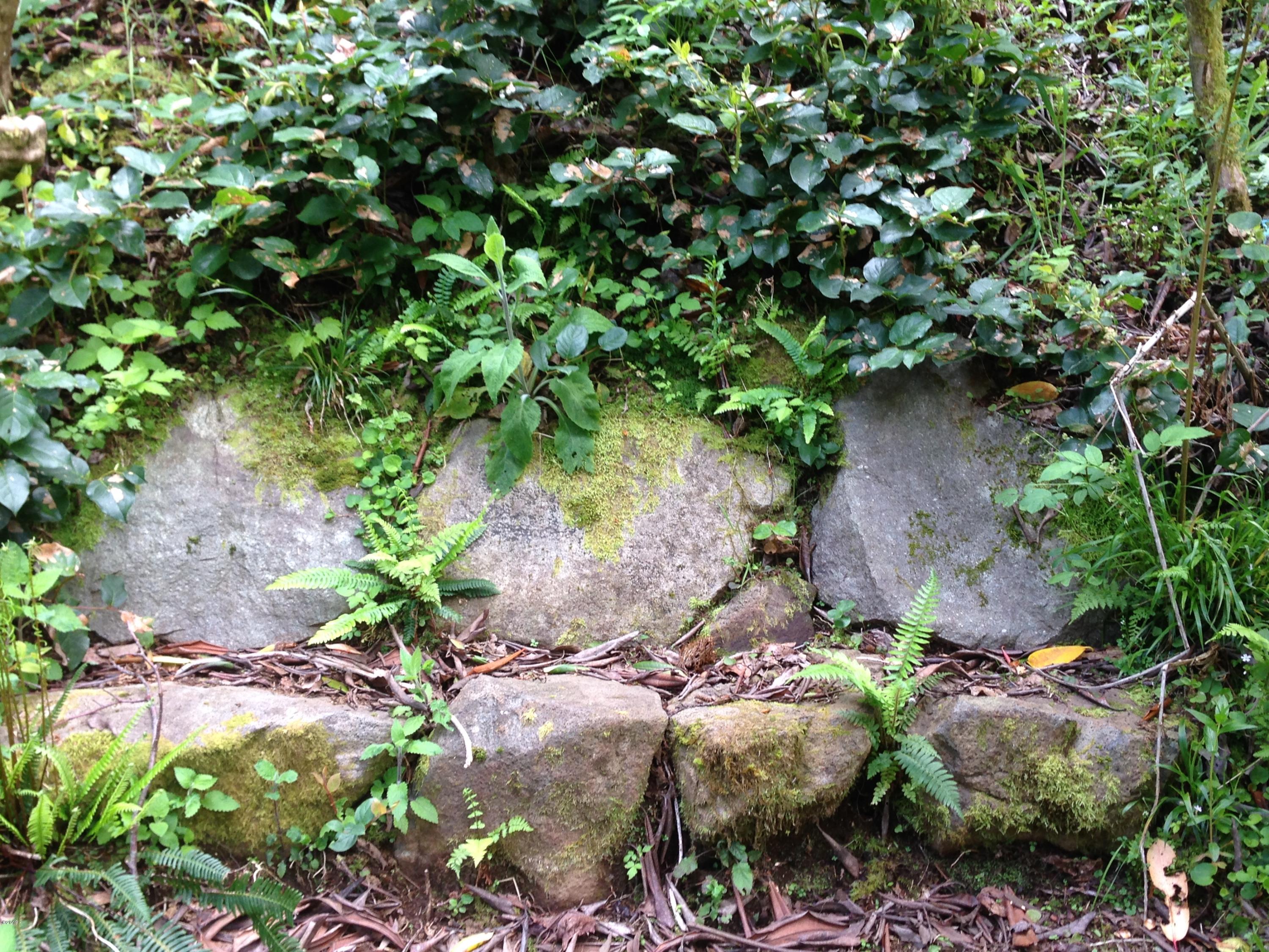 122 Reeves Circle Yachats, OR 97498 - Photo 39 of 40 Rock wall