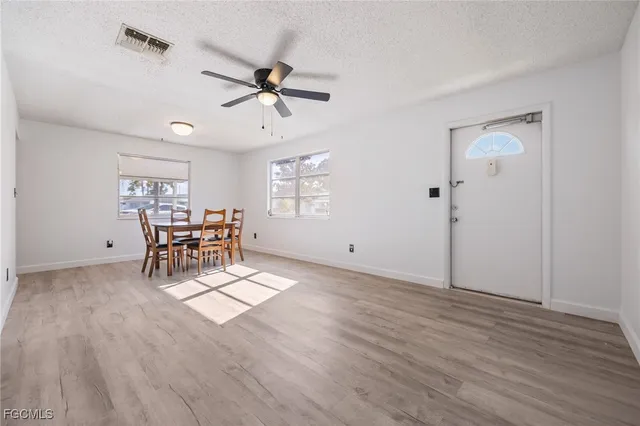 a living room with furniture and window