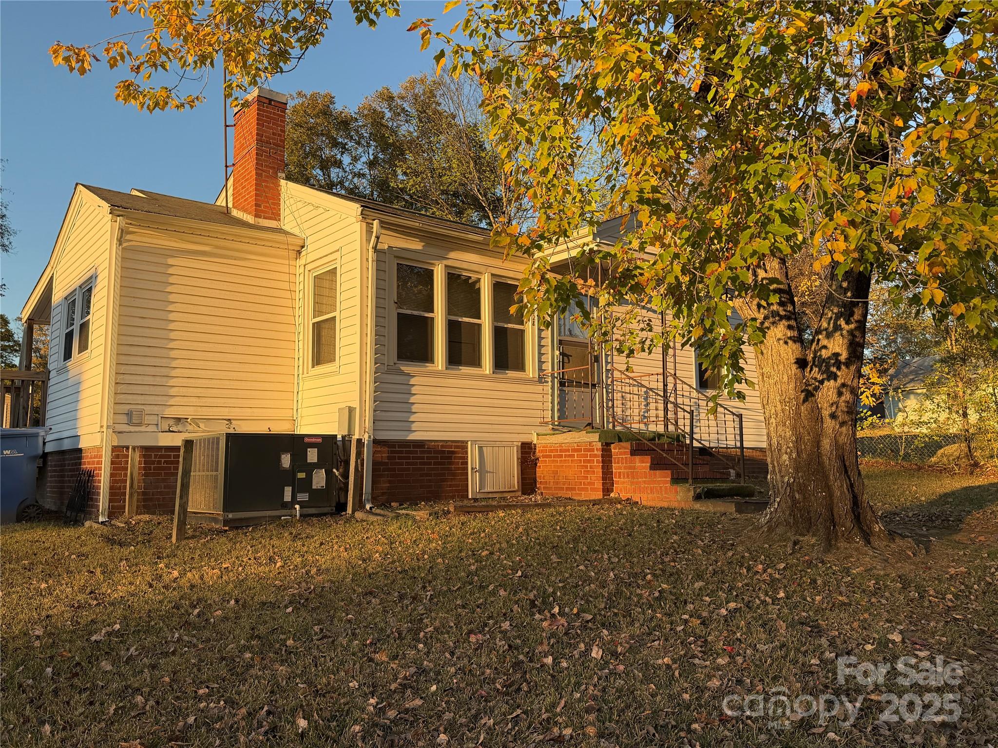 928 Bost Street Albemarle, NC 28001 - Photo 18 of 20 a view of a house with a yard